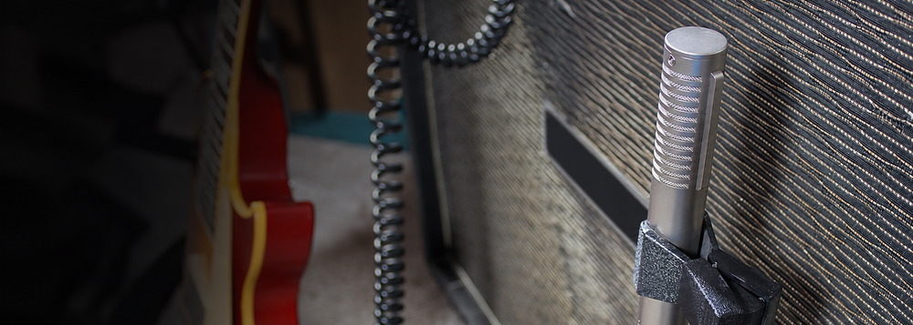 Royer ribbon microphone in front of an amplifier, without promotional lettering