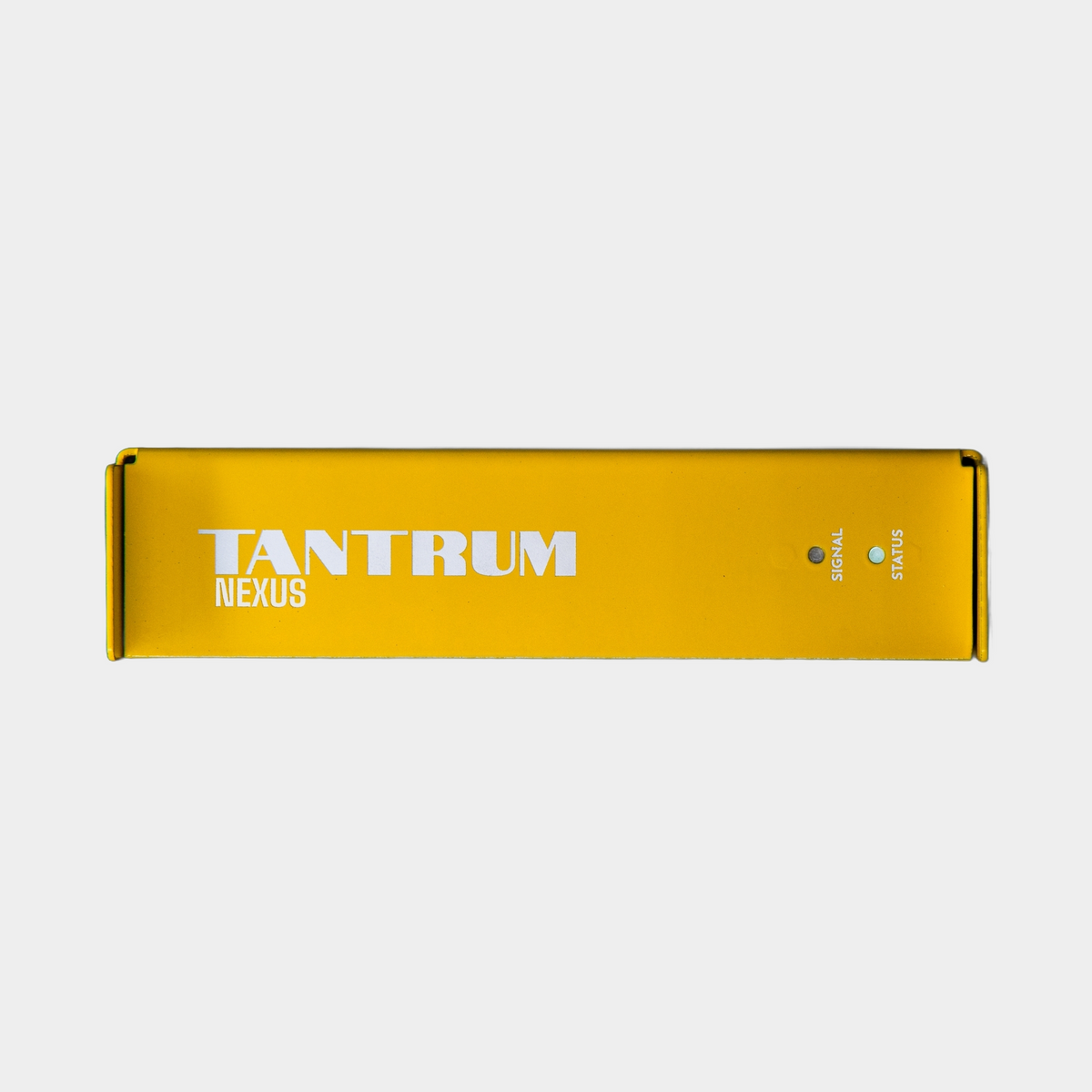 Tantrum Audio NEXUS room correction processor — yellow front panel with signal and status indicators